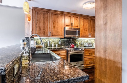 Mammoth Lakes Condo | DELUXE SLOPESIDE Condo with 4th FLOOR VIEWS, Elevator and Underground Parking at Canyon Lodge (1849 Condos 409) by RedAwning