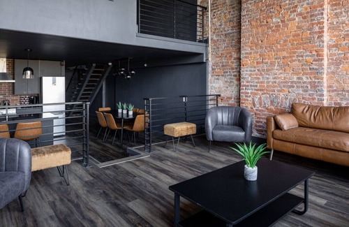West Main Historic District Condo | DerbyCity Plush Loft. Gather in Style by Hollyhock