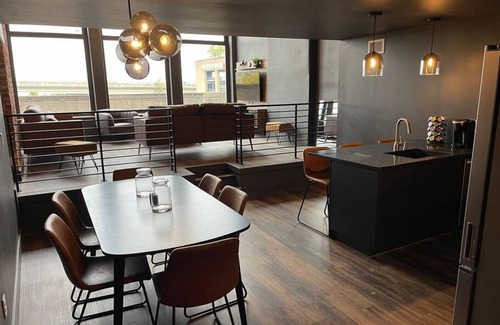 West Main Historic District Condo | DerbyCity Plush Loft. Gather in Style by Hollyhock