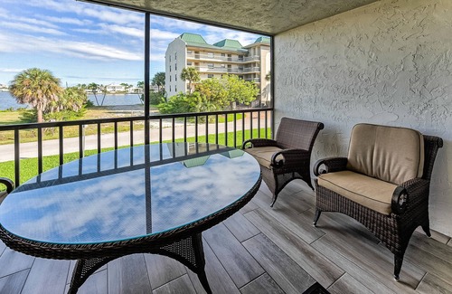 Vanderbilt Beach Condo | Designer Condo! Walk to the Beach! Bay Views! Rooftop Pool! Fully Renovated!
