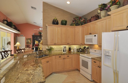 Central Naples House | Designer Furnished Lakefront Home In Briarwood Development
