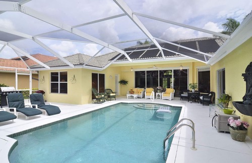Central Naples House | Designer Furnished Lakefront Home In Briarwood Development