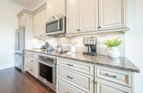 Villa Lago House | Designer Golf View Beach Home with 6 Seat Golf Cart