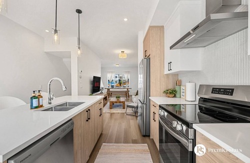 Springbank Hill House | Designer-Inspired Home » King Bed » Garage » AC #21