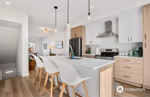 Springbank Hill House | Designer-Inspired Home » King Bed » Garage » AC #21