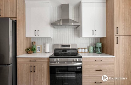 Springbank Hill House | Designer-Inspired Home » King Bed » Garage » AC #21