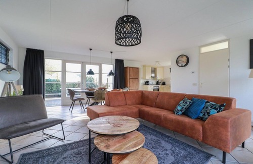 Makkum Cabin | Detached dune villa with a spacious yard, bathtub, and two patios close to the beach at Beach Resort Makkum.