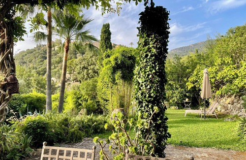Deia House | Detached natural stone house with a beautiful garden and small pool.
