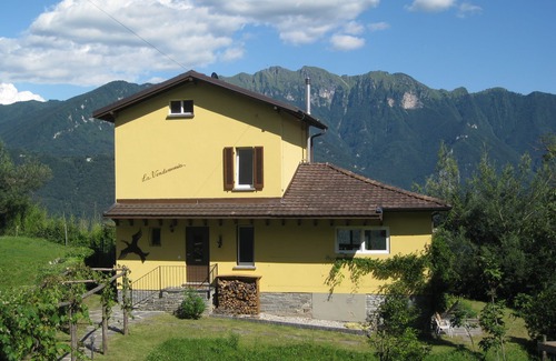 Carona House | Detached vacation home with a large garden to run around in and wonderful views