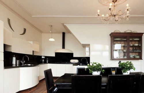 Oostwoud House | Detached villa with large garden on the water, hot tub, sauna and boats