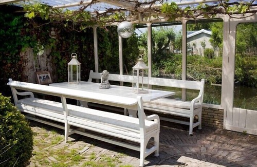 Oostwoud House | Detached villa with large garden on the water, hot tub, sauna and boats