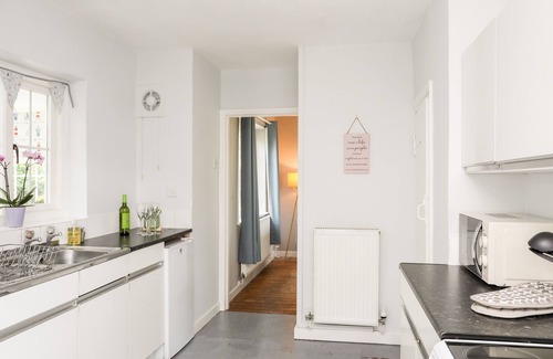 Llangaffo Cottage | DINAM LODGE, character holiday cottage, with open fire in Llangaffo