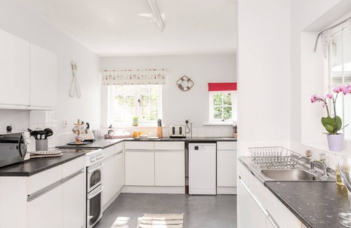 Llangaffo Cottage | DINAM LODGE, character holiday cottage, with open fire in Llangaffo