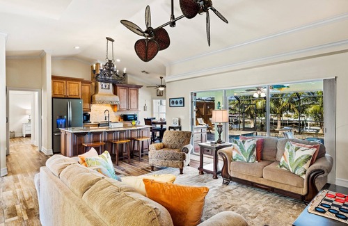 Fort Myers Villa | Direct Access Waterfront Villa with Heated Pool & Spa - Edgewater Escape - Roelens Vacations