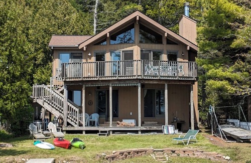 Beulah House | Direct Crystal Lake sandy swimming home. Kayaks, dock, firepit, AC Dog ok