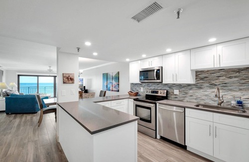 New Smyrna Beach Condo | Direct oceanfront condo with a large balcony and a heated beachfront pool