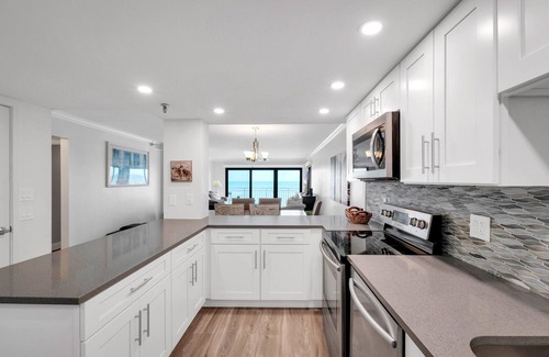New Smyrna Beach Condo | Direct oceanfront condo with a large balcony and a heated beachfront pool