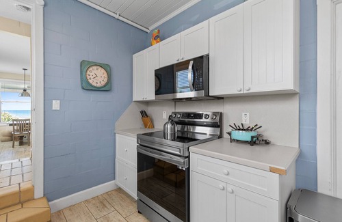 New Smyrna Beach House | Direct Oceanfront, Pet Friendly, Veranda and Front Porch Beach House on Hill Str
