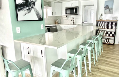 Milford House | Direct Waterfront "The Palms" Beach House