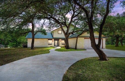 Concan House | Directly ON the Frio River in Concan, TX, private swimming pool, huge outdoor gathering space