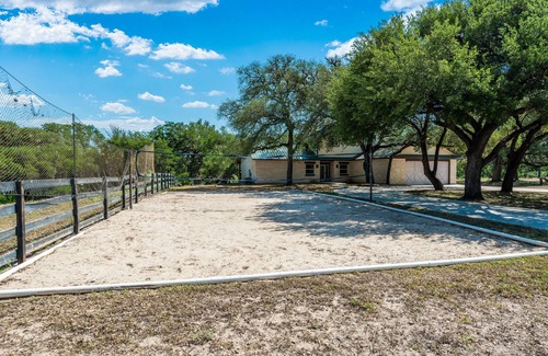 Concan House | Directly ON the Frio River in Concan, TX, private swimming pool, huge outdoor gathering space