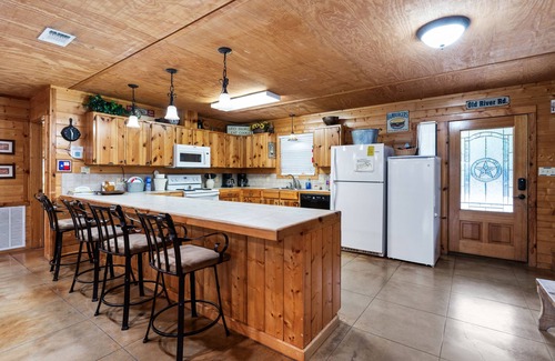 Sabinal House | Directly ON the Frio River with exclusive river frontage, shuffleboard table & room for 25 guests