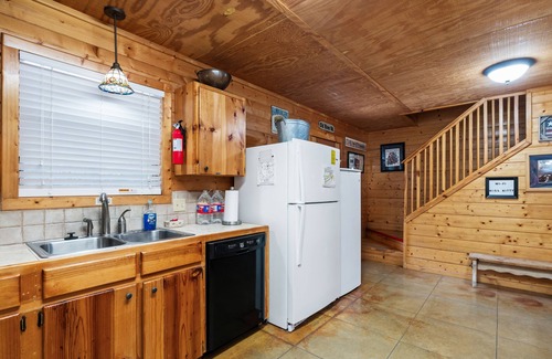 Sabinal House | Directly ON the Frio River with exclusive river frontage, shuffleboard table & room for 25 guests