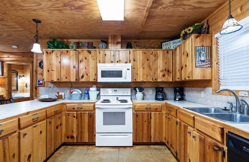 Sabinal House | Directly ON the Frio River with exclusive river frontage, shuffleboard table & room for 25 guests