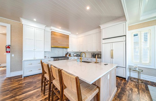 Stone Harbor House | Discover the epitome of coastal living in this exceptional bayfront residence, a true gem boasting.