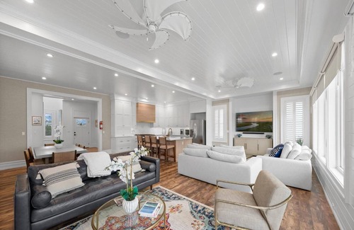 Stone Harbor House | Discover the epitome of coastal living in this exceptional bayfront residence, a true gem boasting.