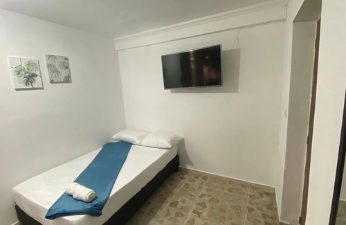 Estadio Hotel | "Discover your ideal retreat in Medellín! In the heart of the city,