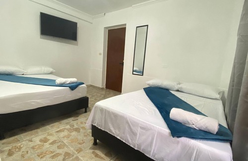 Estadio Hotel | "Discover your ideal retreat in Medellín! In the heart of the city,