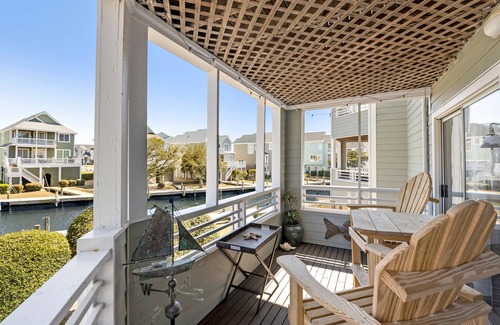 Manteo Condo | Dock Holiday: Canalfront condo, Water Views, Fisherman's dream with Boat Dock