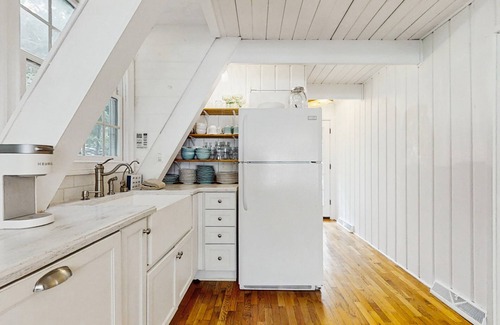Charlevoix House | Dog-friendly A-frame home near beaches & downtown with firepit, deck, badminton
