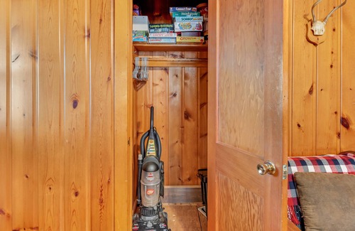 Presque Isle Cabin | Dog-friendly cabin with lakefront views, swimming, fishing, firepit, & rec room