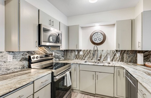 Teton Village Condo | Dog-friendly condo with pool, 3 tennis courts, hot tub, & fireplace