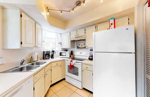 Ocean Side Village Condo | Dog-friendly condo near the beach with outdoor pool, hot tub, gym, balcony, W/D