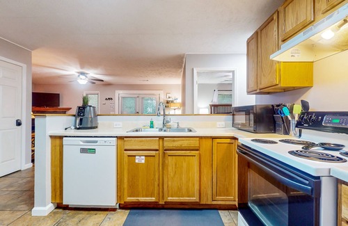 Sevierville Cabin | Dog-friendly condo w/hot tub & nature’s serenity +free attraction tickets