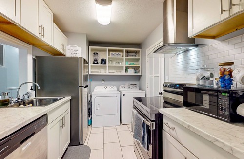 Westgate House | Dog-friendly hideaway with patio, smart TVs, electric fireplace, games, & AC