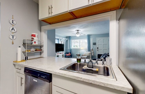Westgate House | Dog-friendly hideaway with patio, smart TVs, electric fireplace, games, & AC
