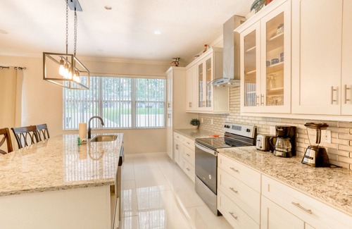 Legacy Park House | Dog-friendly home near Disney World with private pool, pool spa & washer/dryer