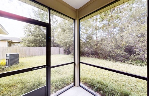 Westside House | Dog-friendly home with a screened porch, washer/dyer, games & modern charm