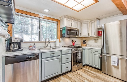 West Village House | Dog-friendly home with covered deck, fireplace, washer/dryer, & ping-pong table