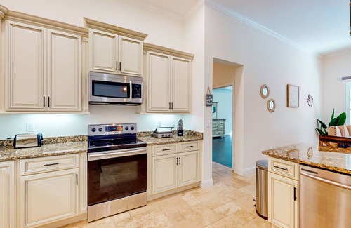 Indian Trails House | Dog-friendly home with Tesla EV charger, yard, patio, grill, AC, & W/D