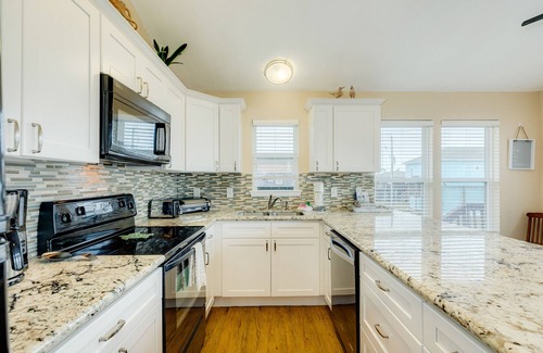 Terramar Beach House | Dog-friendly home with pool access, large deck, lawn games, washer/dryer & AC