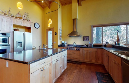 Groveland House | Dog-friendly home with two lofts, deck, pool, & 3 beaches