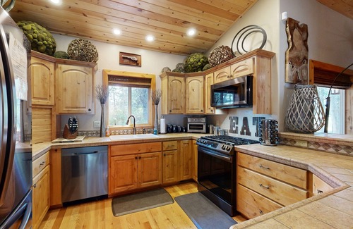 McCall House | Dog-friendly home with central AC, fireplace, deck, grill, firepit, W/D, & WiFi
