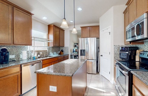 Pflugerville House | Dog-friendly house with patio, enclosed backyard and shared pool