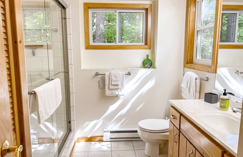 Minocqua House | Dog-friendly lakeside charmer with deck, dock access, & wood-burning fireplace