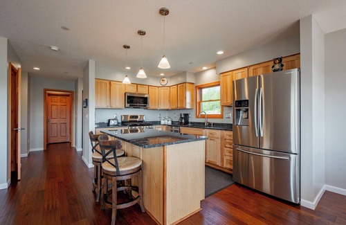 Waterfront Greens House | Dog Friendly Lake Escape w/Dock Slip & Hot Tub